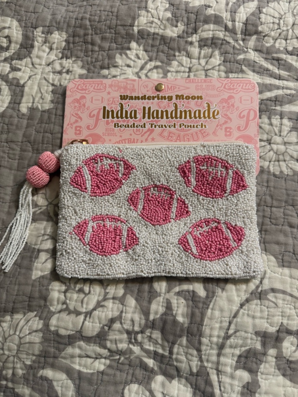 Handbeaded pink football bag